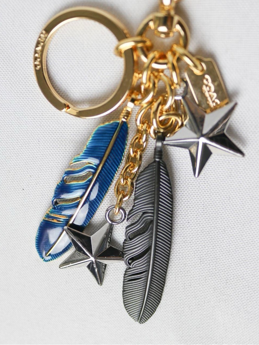 Coach Blue & Silver Feather and Star Bag Charm Keyring - Picture 7 of 7